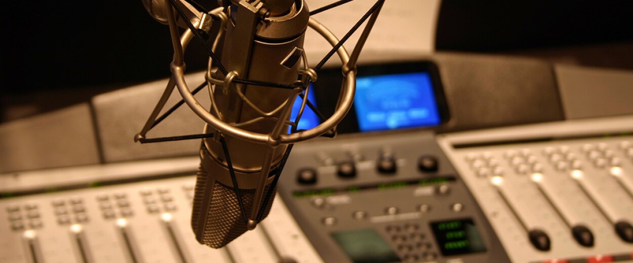 Microphone with soundboard technology in the background