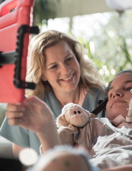 An actor, seen here, is portraying a nurse giving patients a voice by creating an app.
