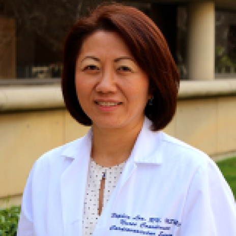 Headshot of woman in lab coat