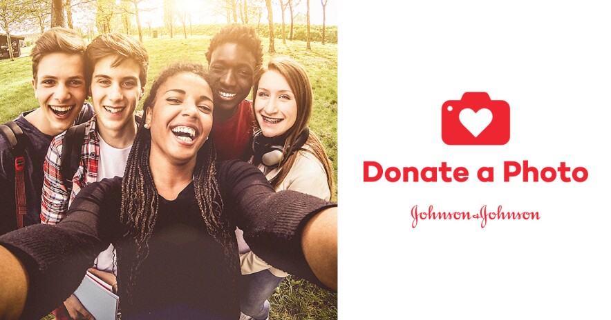 A group of teens smiling and taking a selfie for Donate a Photo
