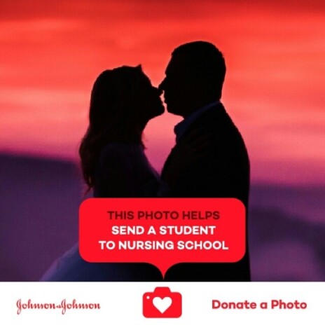 Donate a Photo promo image with a couple sharing a kiss with a sunset in the background
