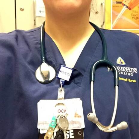 Selfie of Johns Hopkins nurse in scrubs