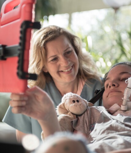 An actor, seen here, is portraying a nurse giving patients a voice by creating an app.