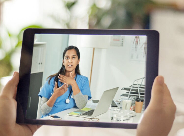 Patient speaking to nurse via a telehealth appointment