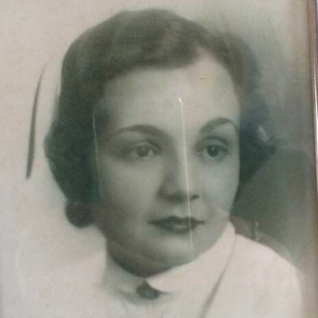 Black and white picture of female nurse from decades ago